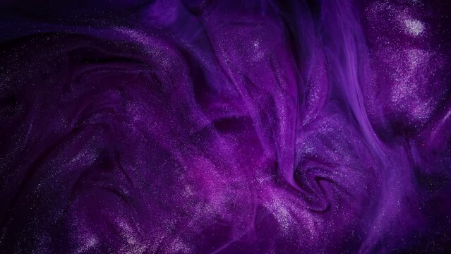 Dark Lilac Dreams. Slow-Motion Ink in Motion on a Dark Purple Acrylic Background