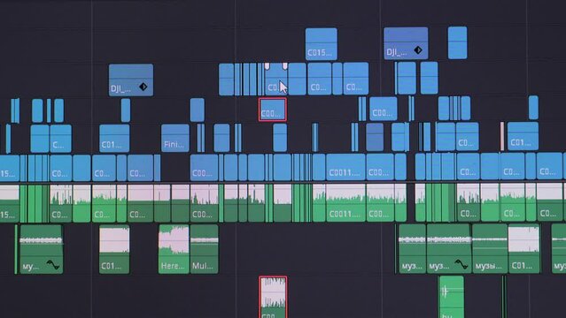 Close up of video editing time line and computer monitor as video editor works on edit Video editing on computer. fix work of program for video editing, video processing, post-production, clip maker