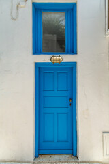 Fototapeta na wymiar Old house blue door