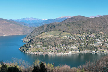 Fototapeta na wymiar The View to the Lake Lugano and the surrounding Mountains from Serpiano, Ticino, Switzerland