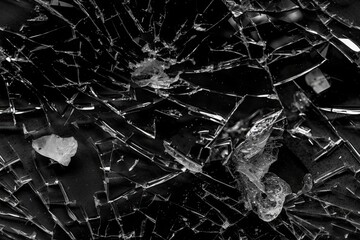 sharp glass fragments over a dark background. Generative AI