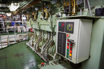 Ship's engine room. Vessel's ( Ship ) Engine Room Space / industrial stairs. Ship's Engine Heavy Machinery Space - Pipes, Valves, Engines