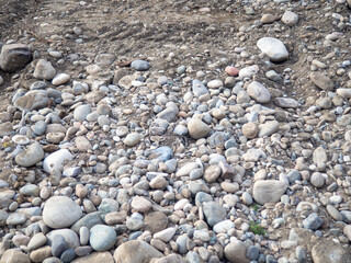 Repair of the embankment of the seaside resort. Preparing for the tourist season. Leveling the ground on the beach