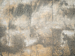 Background of brown tiles and small pebbles. Solid material pattern. Pebbles on tiles.
