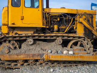 Bulldozer for excavation. B10PM. Tractor from the Chelyabinsk Tractor Plant. Part of an orange tractor.