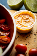 Chipotle sauce with tomatoes around