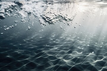 Water texture overlay effect with blur for photographs and mockups. On a white wall, there is an organic drop diagonal shadow with a faint caustic effect. Shadows for effects of natural lighting
