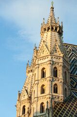 Fototapeta na wymiar Vienna's St. Stephen's Cathedral North Tower In A Sunset Light