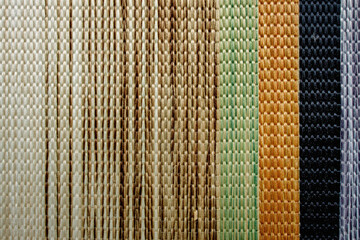 Woven texture multicolored background. Seamless fabric background