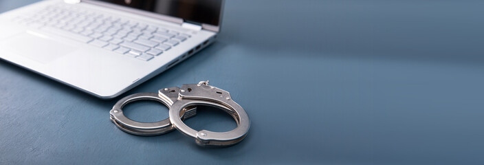 handcuffs with notebook