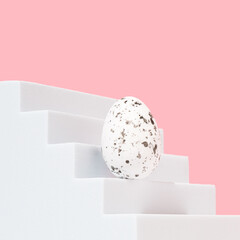 Modern composition made of Easter egg on white stairs. Pastel pink background. Background for branding and packaging presentation. Product concept.