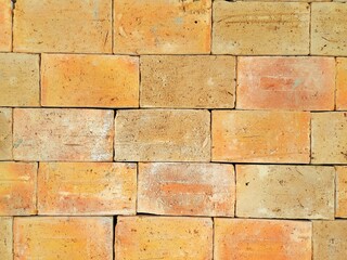 The front of a housewares store made with earth tone bricks. Creative style that mixes the modern with the rustic.