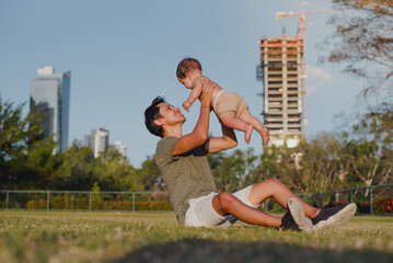 Authentic parenting moment with city skyline