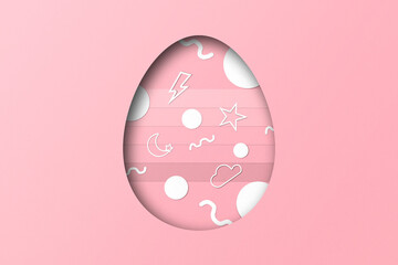 Pink paper cut to form an Easter egg pattern.