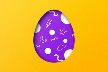 Purple and yellow paper cuts form an Easter egg pattern. overlay paper