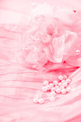 Obraz na płótnie Canvas Close up of pink rose wedding dress lace and fabric