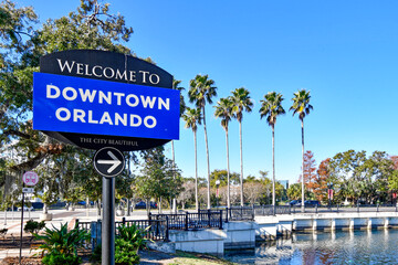 Welcome to downtown Orlando sign with palm trees in central Florida