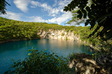 A large and beautiful cenote in a tropical country