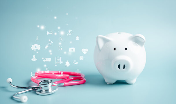 Piggy bank with stethoscope. saving money to health check insurance concept. Health care financial checkup and saving for medical insurance cost planning in the future.