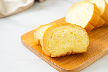 potatoes bread sliced on wood board