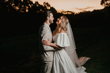 romantic couple in wedding outfit