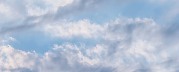 Background of blue sky with white clouds