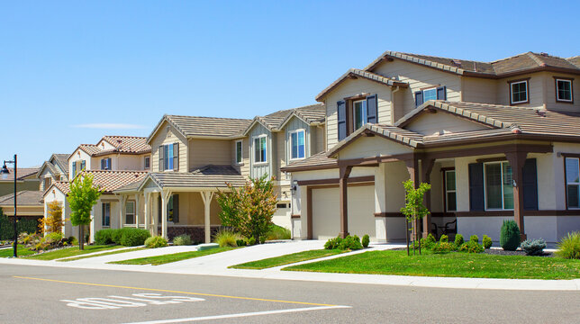 Row of three double story middle class homes in California