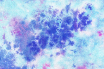 tie dye pattern hand dyed on cotton fabric abstract texture background.