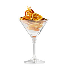 Orange chips in a glass bowl on a white background.