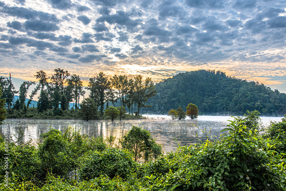 Wall mural Sunrise on Broken Bow Lake