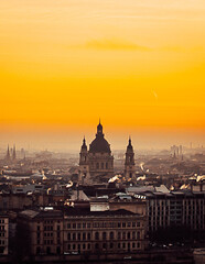 Fototapeta premium stock photo of view of dome of budapest church at sunrise
