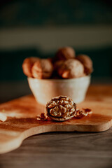 Greek nuts in shell on a wooden board