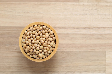 Top view of Soybeans in a bowl on wooder background, Healthy eating concept