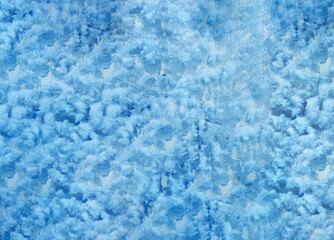 Fototapeta na wymiar Texture of frozen glass covered with snow.