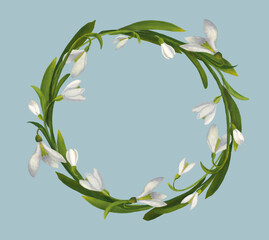 Round frame wreath of white snowdrops on a blue background. Spring mood for postcard, banner, template for your design