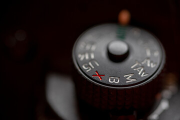 closeup of a mode dial of a digital camera