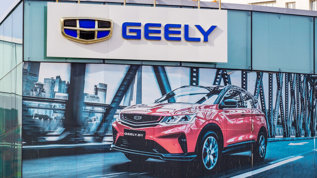 Minsk, Belarus - March 31, 2022: Geely. A sign with the Geely logo on the dealership building.