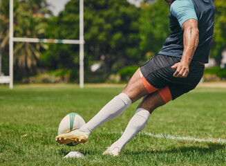 Rugby, sports man or kickball in game, practice workout or training match on stadium field...