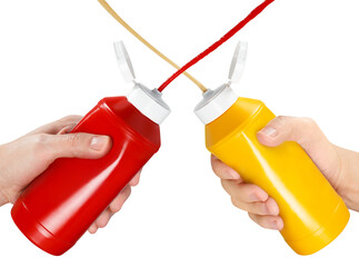 Hands squeezing ketchup and mustard out of plastic bottles, cut out