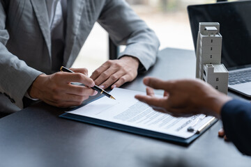 Entrepreneur, business owner, accountant, real estate agent A young Asian insurance agent explains...