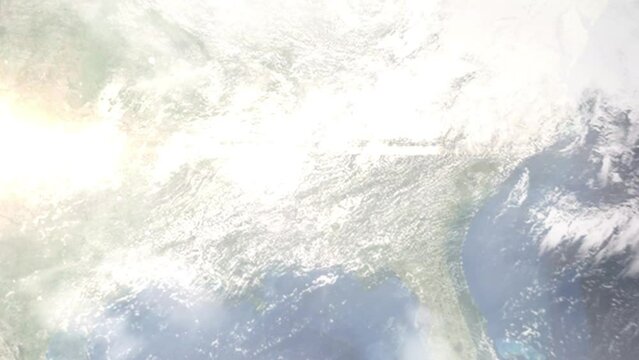 Earth zoom in from outer space to city. Zooming on Bessemer, Alabama, USA. The animation continues by zoom out through clouds and atmosphere into space. Images from NASA