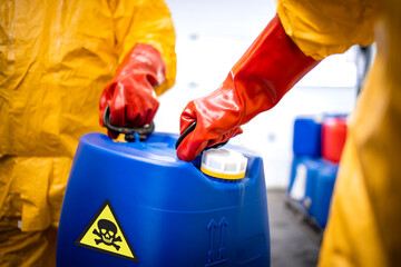 Distribution and transport of dangerous and hazardous chemicals. Close up view of plastic canister...