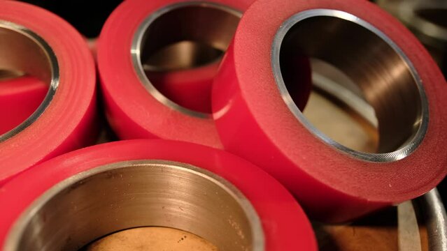 Polyurethane coated rollers after recoating