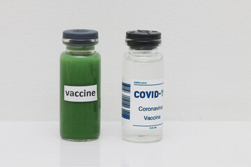 Two vials of covid-19 vaccine.