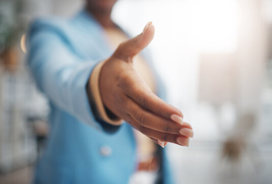 Business woman, handshake and partnership for support, trust or deal in collaboration or meeting at office. Female employee shaking hands for introduction, interview or greeting in teamwork at work