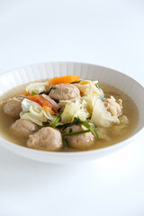 Meatball and vegetables soup in bowl
