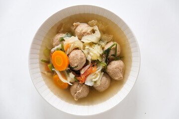 Meatball and vegetables soup in bowl