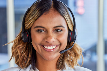 Telecom, call center or portrait of happy woman in lead generation for communications company. Friendly smile, crm or face of Indian girl sales agent working online in technical or customer support