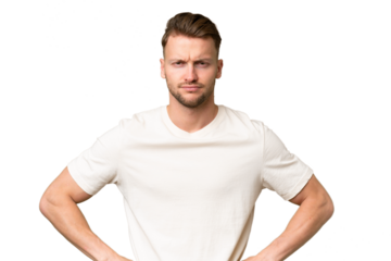 Young blonde caucasian man over isolated background angry