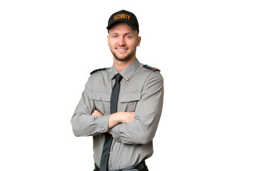Young security caucasian man over isolated background with arms crossed and looking forward